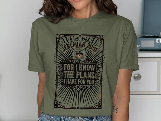 Green t-shirt with "Jeremiah 29:11 For I know the plans I have for you" text.