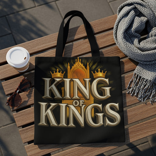 Black tote bag with "KING OF KINGS" text and golden crowns and throne design.