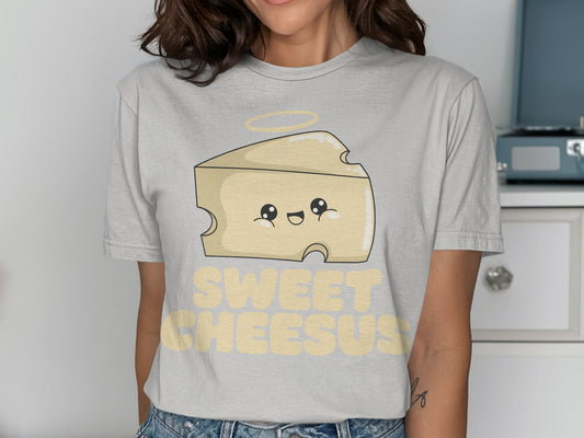 Cartoon cheese wedge with halo and "SWEET CHEESUS" text.