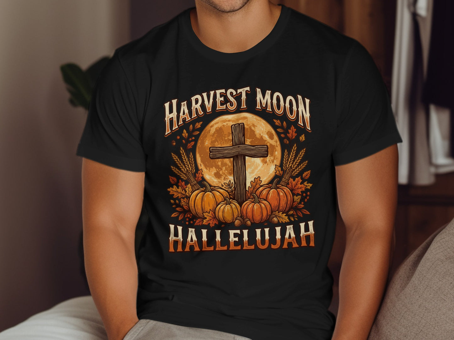 Black t-shirt with "Harvest Moon Hallelujah" and autumn harvest graphic.