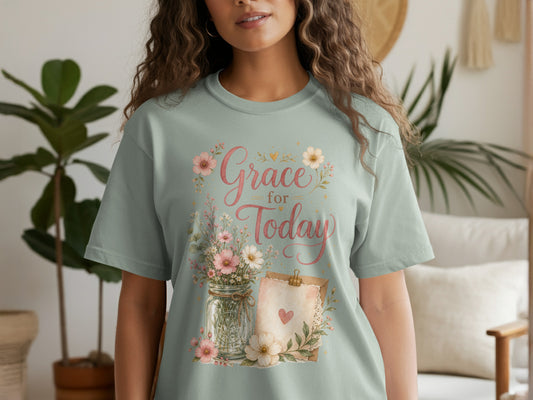 T-shirt with "Grace for Today" text, floral arrangement, and heart on a card.