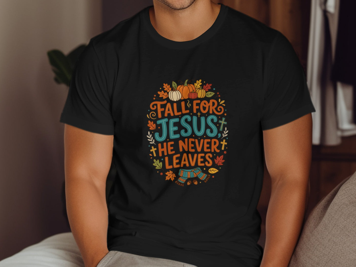 Black t-shirt with "Fall for Jesus, He Never Leaves" autumn graphic.
