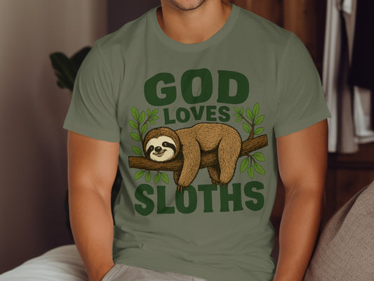 Green t-shirt with "God Loves Sloths" text and a sloth on a branch.