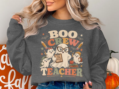 Boo Crew Teacher graphic with ghosts holding clipboards and books.