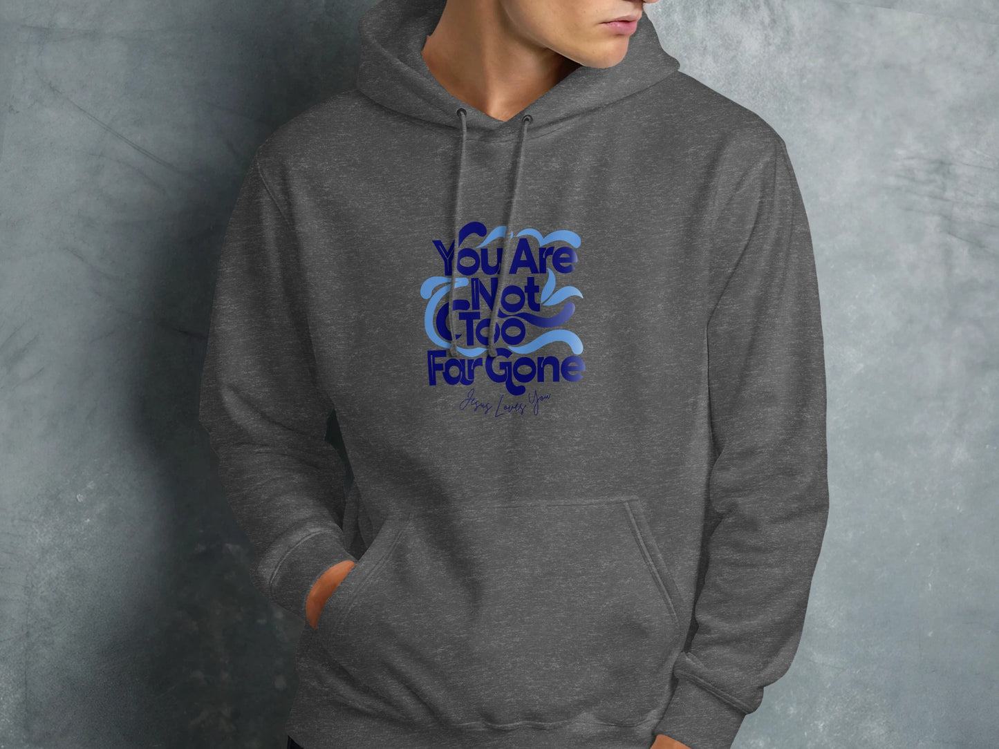 Dark grey hoodie with blue "You Are Not Too Far Gone" text design.