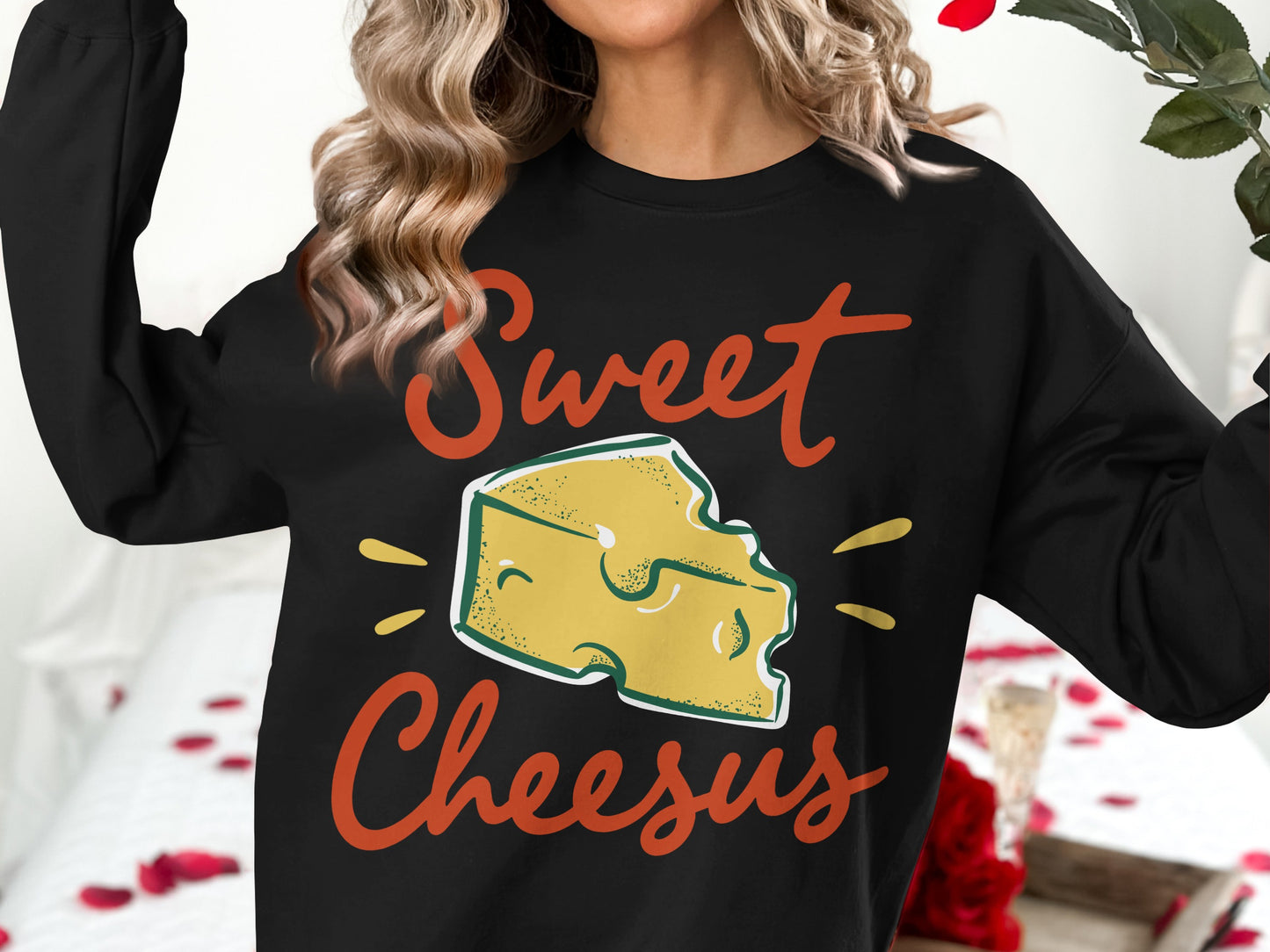 Black sweatshirt with "Sweet Cheesus" text and cheese wedge graphic.