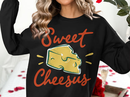 Black sweatshirt with "Sweet Cheesus" text and cheese wedge graphic.