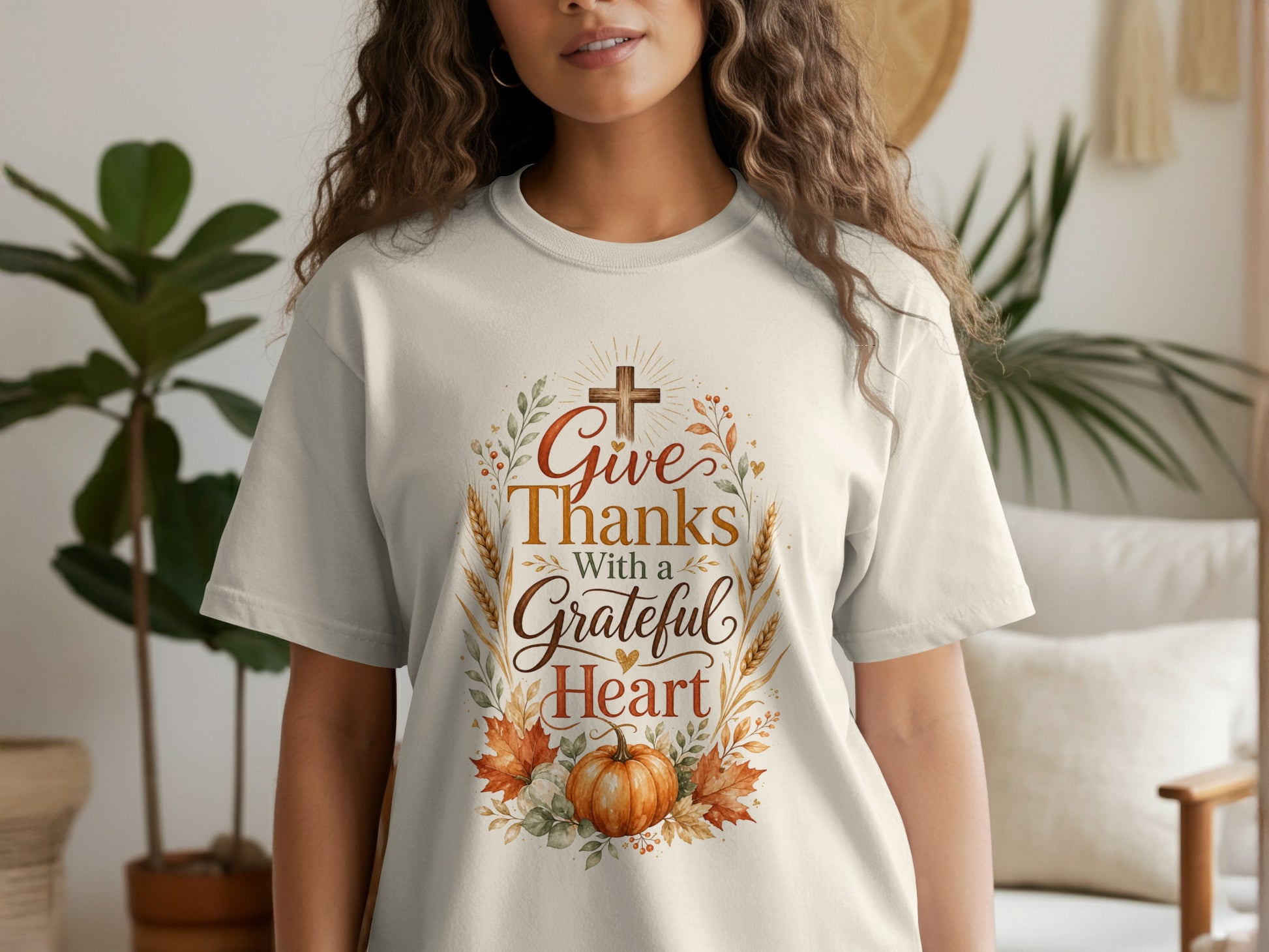 Cream t-shirt with "Give Thanks With a Grateful Heart" text and pumpkin design.
