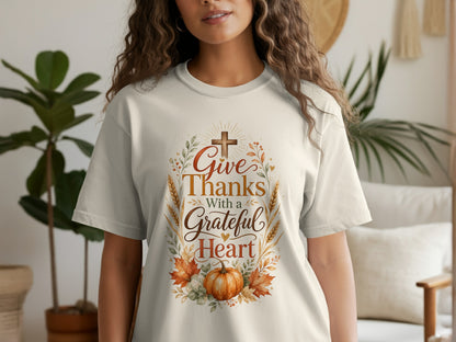 Cream t-shirt with "Give Thanks With a Grateful Heart" text and pumpkin design.