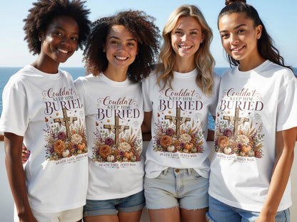 Four women wear white t-shirts with a cross design and text "Couldn't keep him buried".
