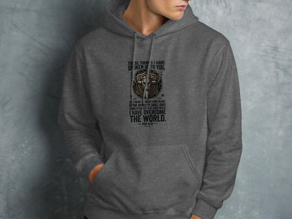 Dark gray hoodie with a distressed graphic and John 16:33 Bible verse.