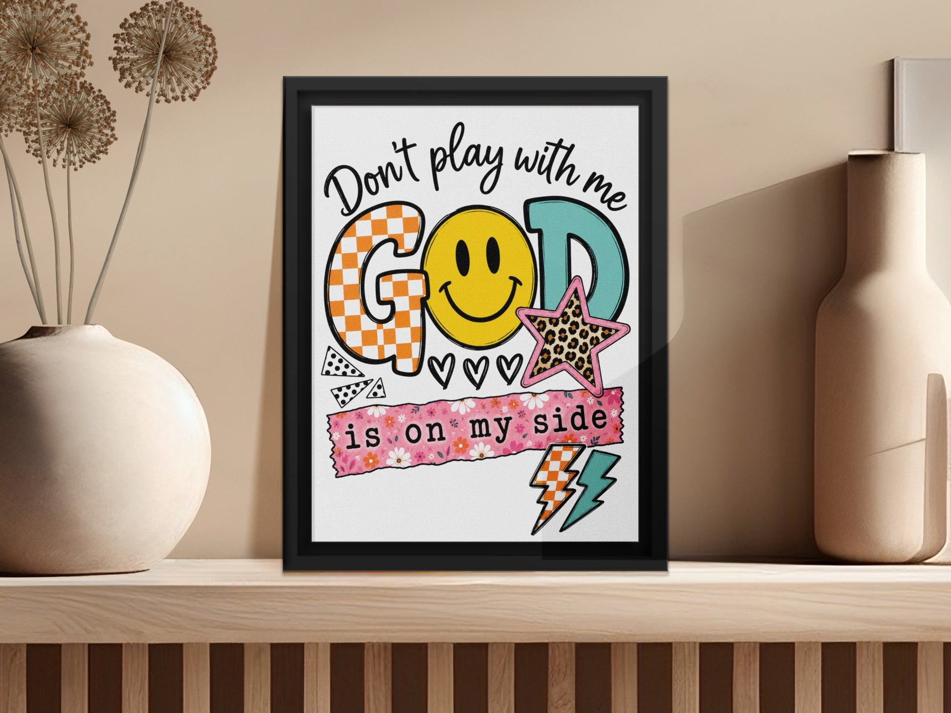 Framed art with text "Don't play with me. GOD is on my side."