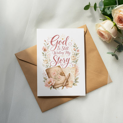 Card with "God Is Still Writing My Story" text surrounded by floral watercolor art.