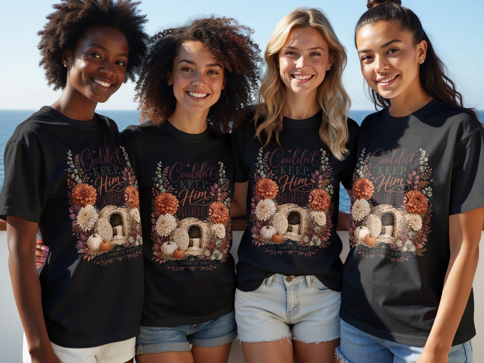 Four women wear black t-shirts with "Couldn't Keep Him Buried" and "The Tomb Is Empty" text.