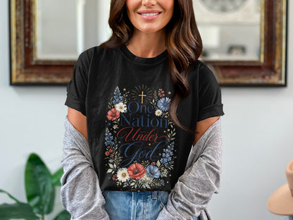 Black t-shirt with a floral wreath design and text "One Nation Under God".
