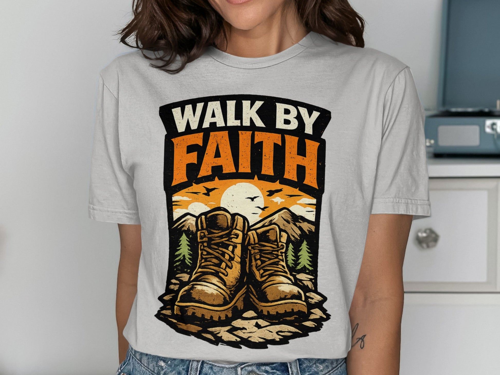 Hiking boots and mountains with "Walk by Faith" text.