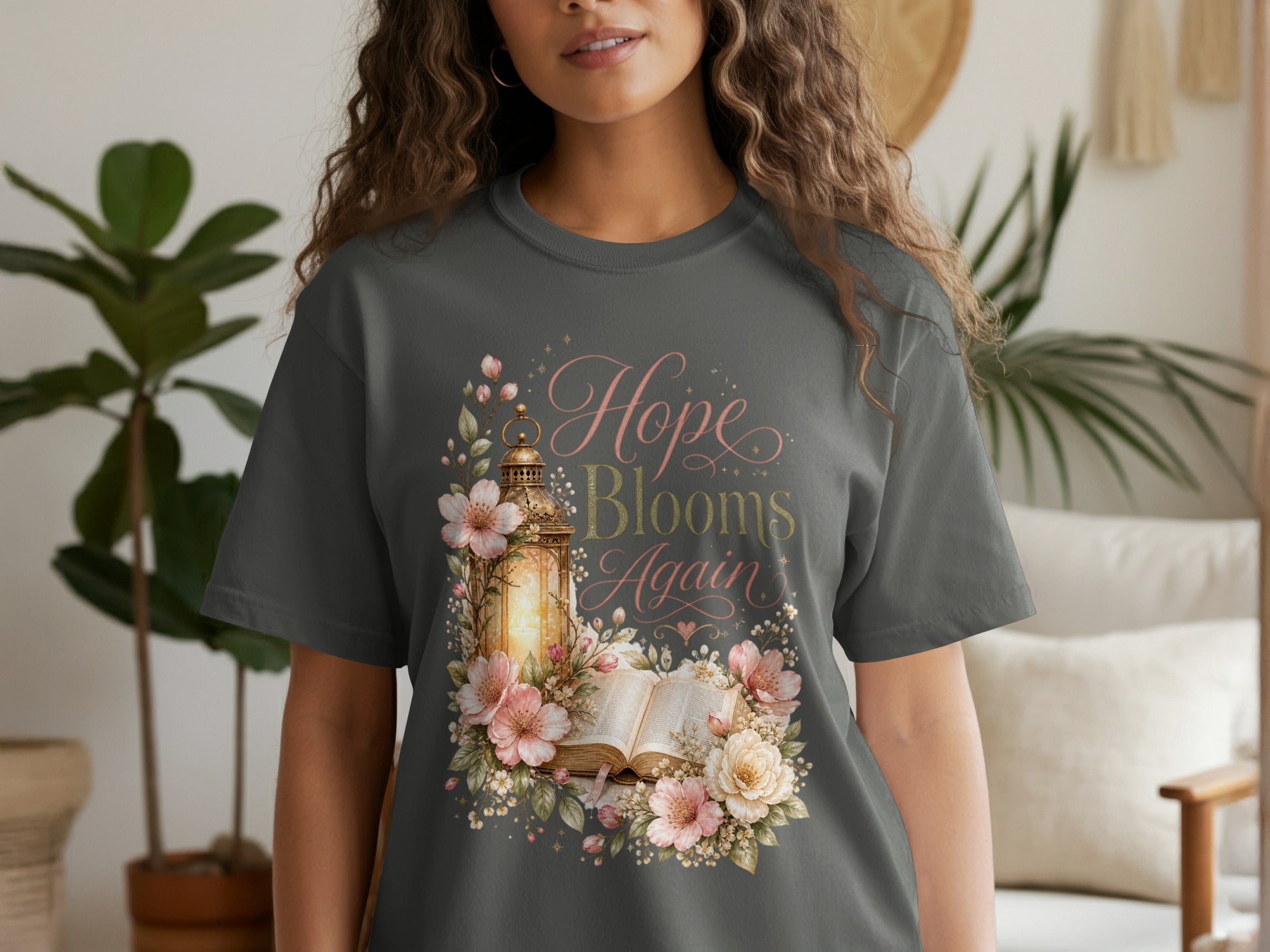 Dark gray t-shirt with "Hope Blooms Again" text and floral lantern design.