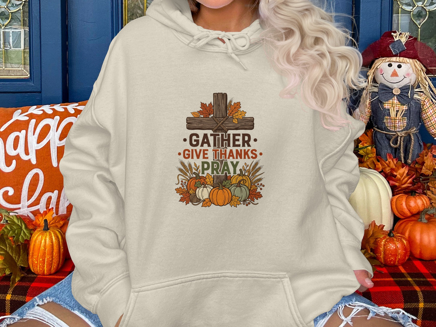 Cream hoodie with "Gather. Give Thanks. Pray." text and harvest illustration.