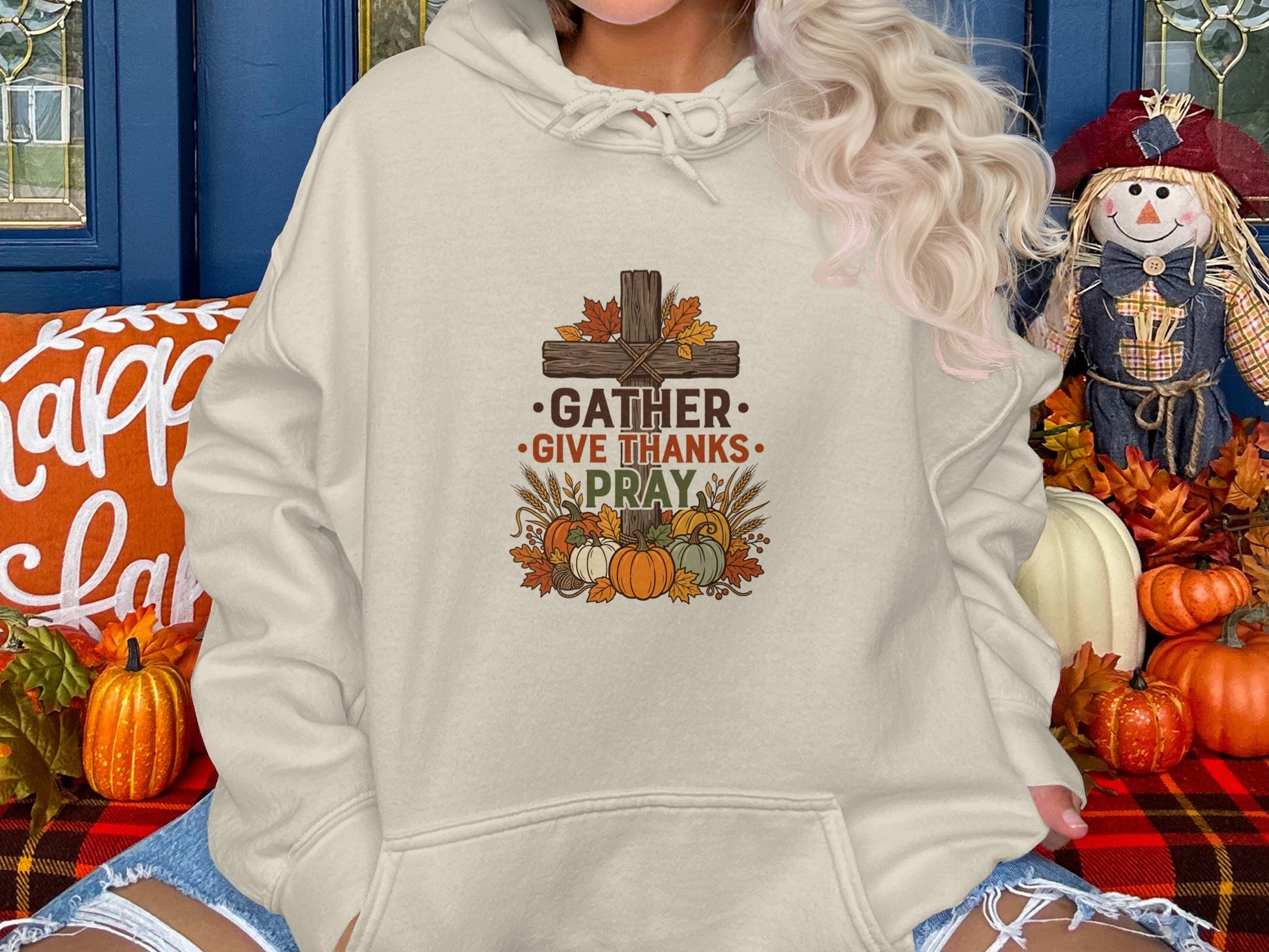 Cream hoodie with "Gather. Give Thanks. Pray." text and harvest illustration.