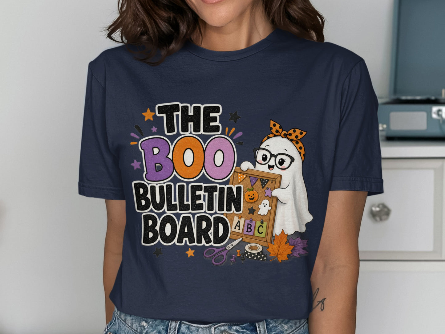 "The Boo Bulletin Board" text with a ghost holding a Halloween-themed bulletin board.