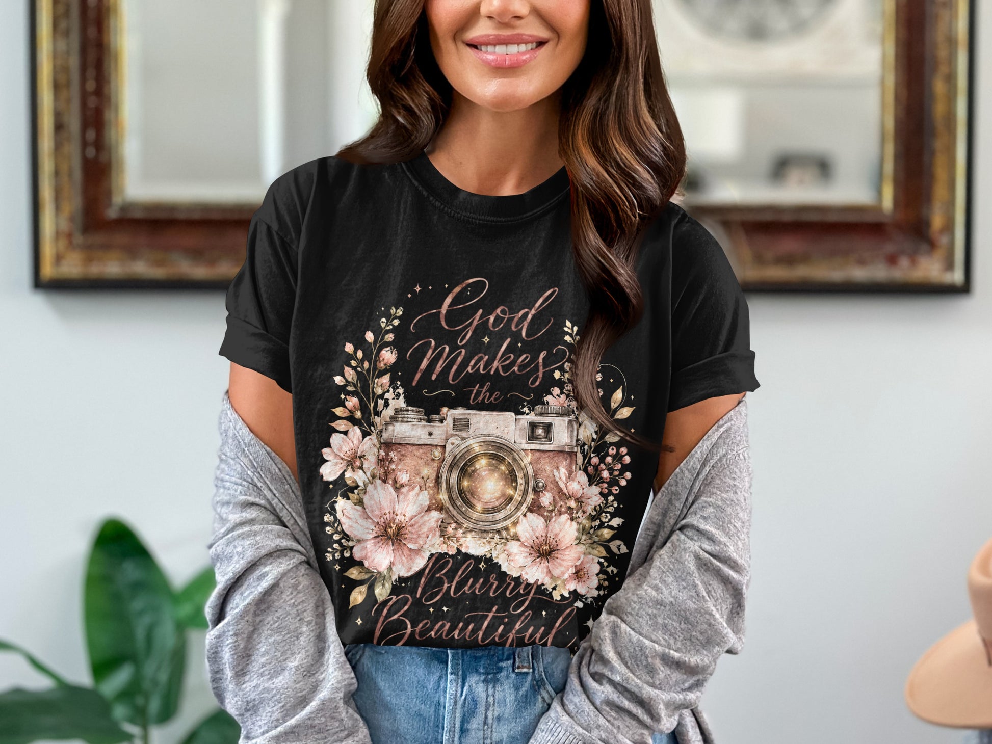 Black t-shirt with floral camera graphic and text "God Makes the Blurry Beautiful".