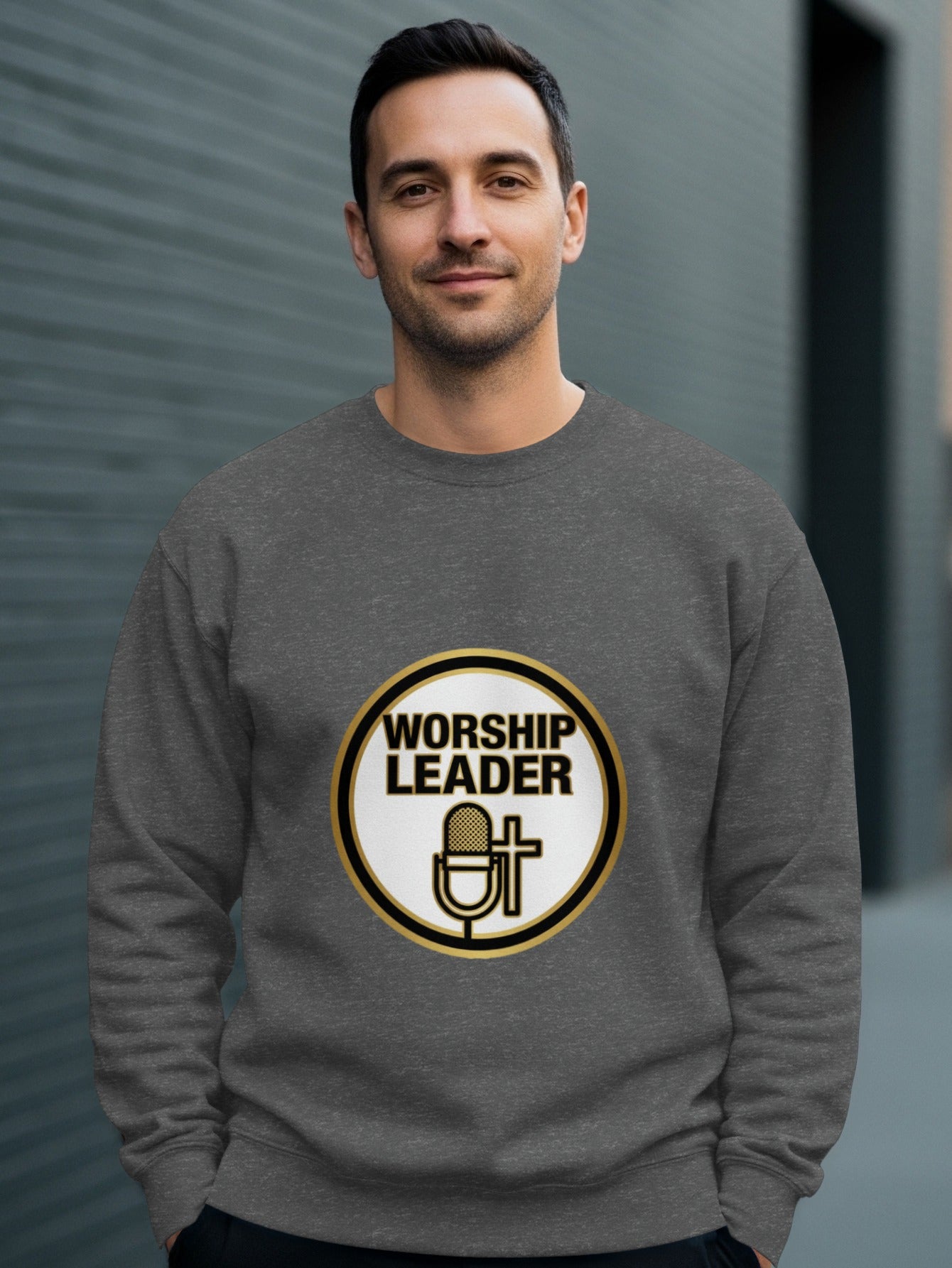 Man wearing a dark gray sweatshirt with "WORSHIP LEADER" logo.