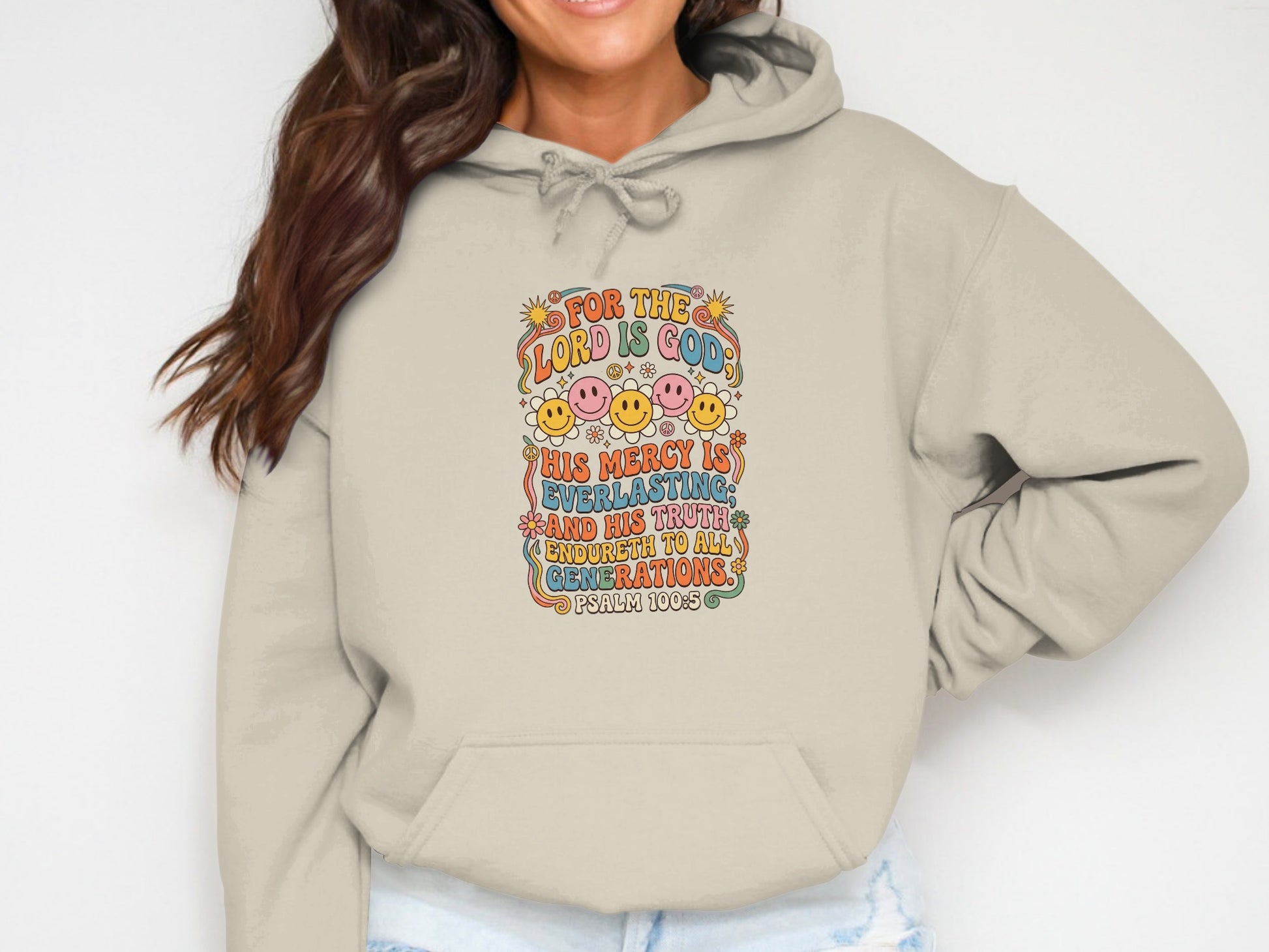 Beige hoodie with "For the Lord is Good" text and smiley faces.
