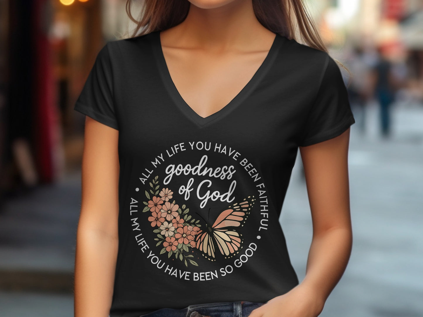 Black t-shirt with "goodness of God" and butterfly design.