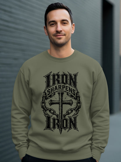 Man wearing a dark green sweatshirt with "Iron Sharpens Iron" and a cross design.