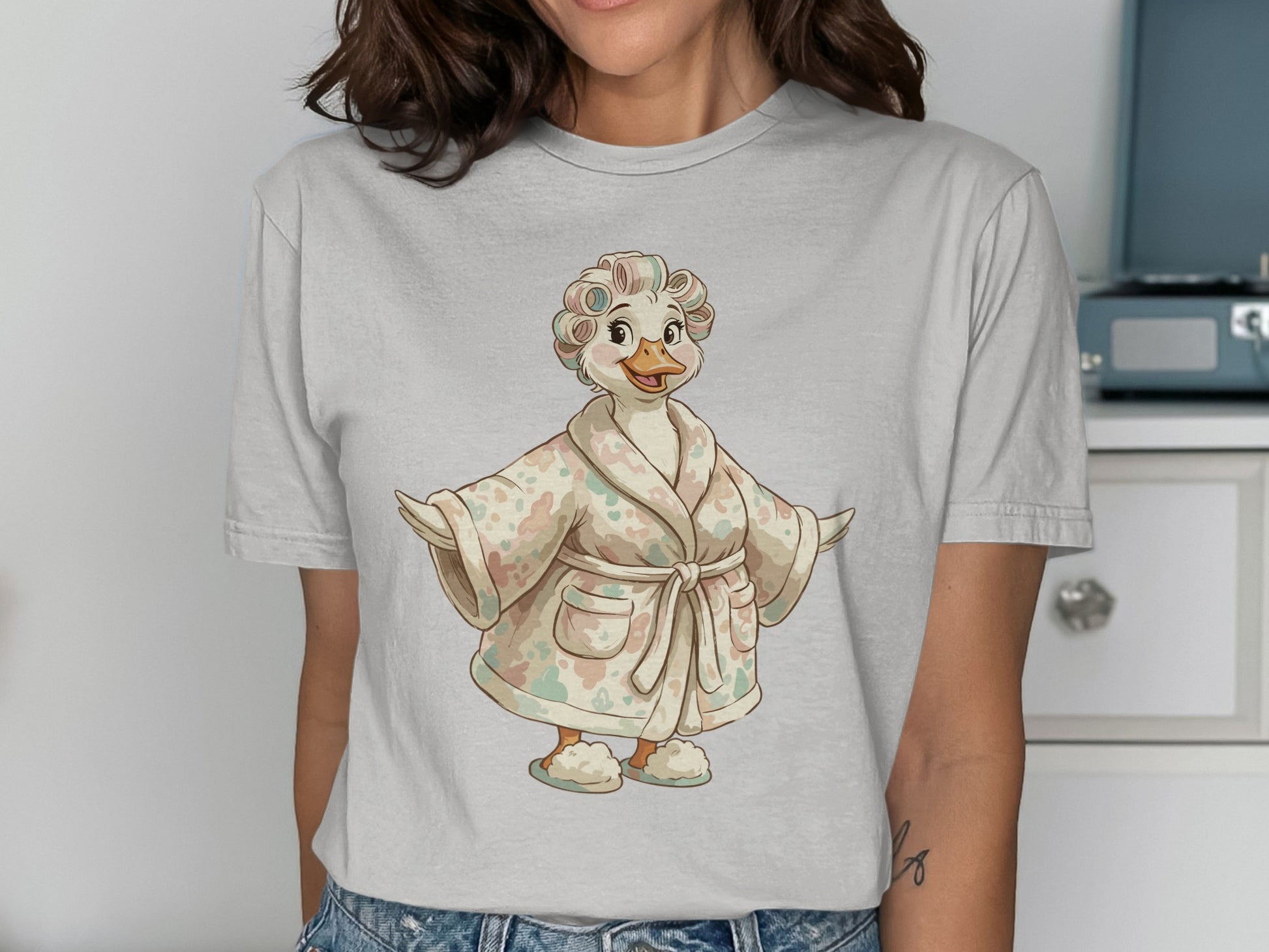 Cartoon duck in bathrobe and slippers with curlers in hair.