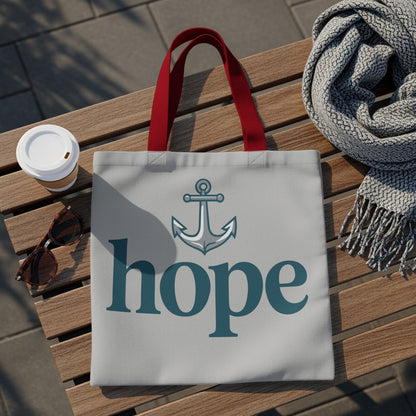 Tote bag with an anchor icon and the word "hope" in teal on a light gray background.