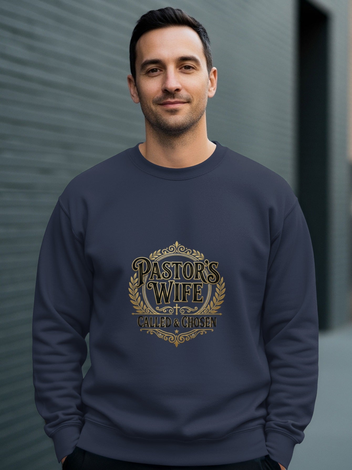 Navy sweatshirt with gold text "Pastor's Wife Called & Chosen" and laurel wreath.