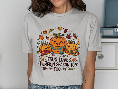 Three smiling pumpkins in scarves with fall leaves and "Jesus Loves Pumpkin Season Too" text.