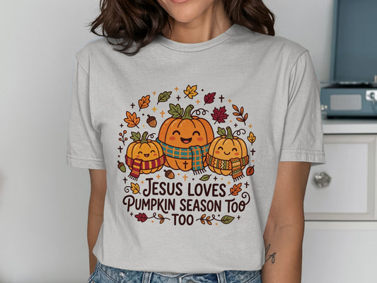 Three smiling pumpkins in scarves with fall leaves and "Jesus Loves Pumpkin Season Too" text.