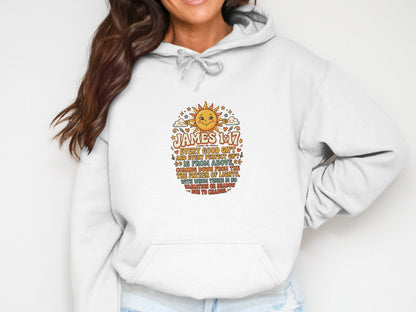 White hoodie with "James 1:17" Bible verse and sun graphic.