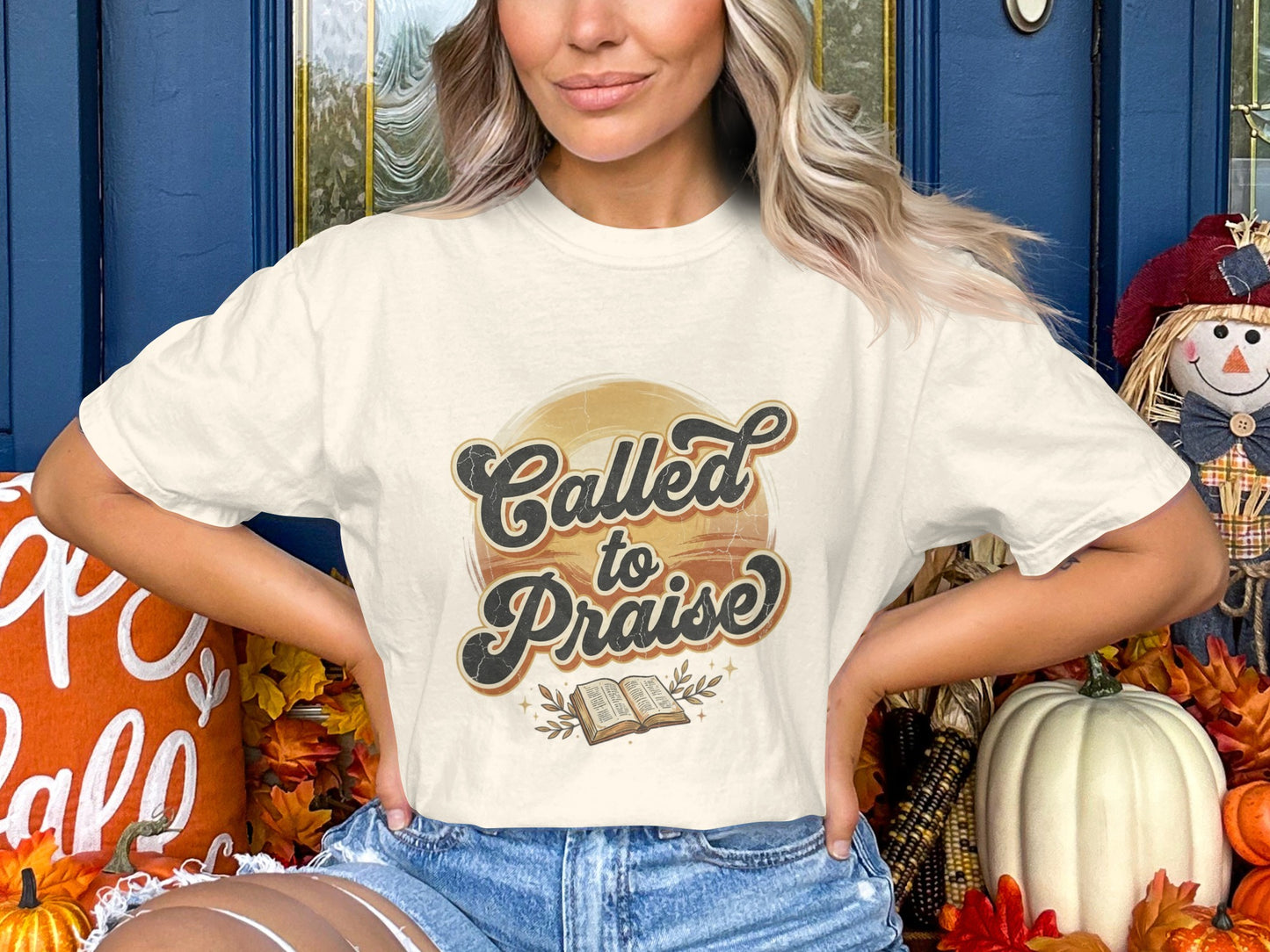 T-shirt with "Called to Praise" text and an open book graphic.