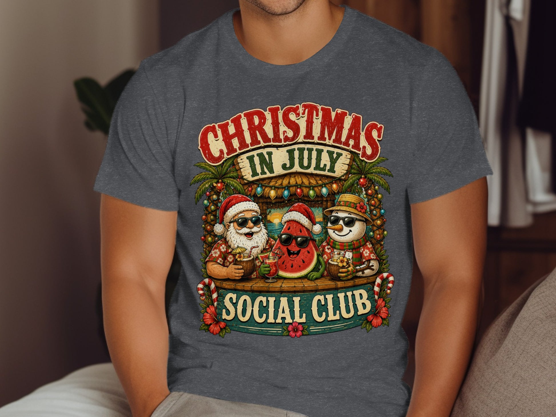Christmas in July Social Club t-shirt with Santa, watermelon, and snowman.