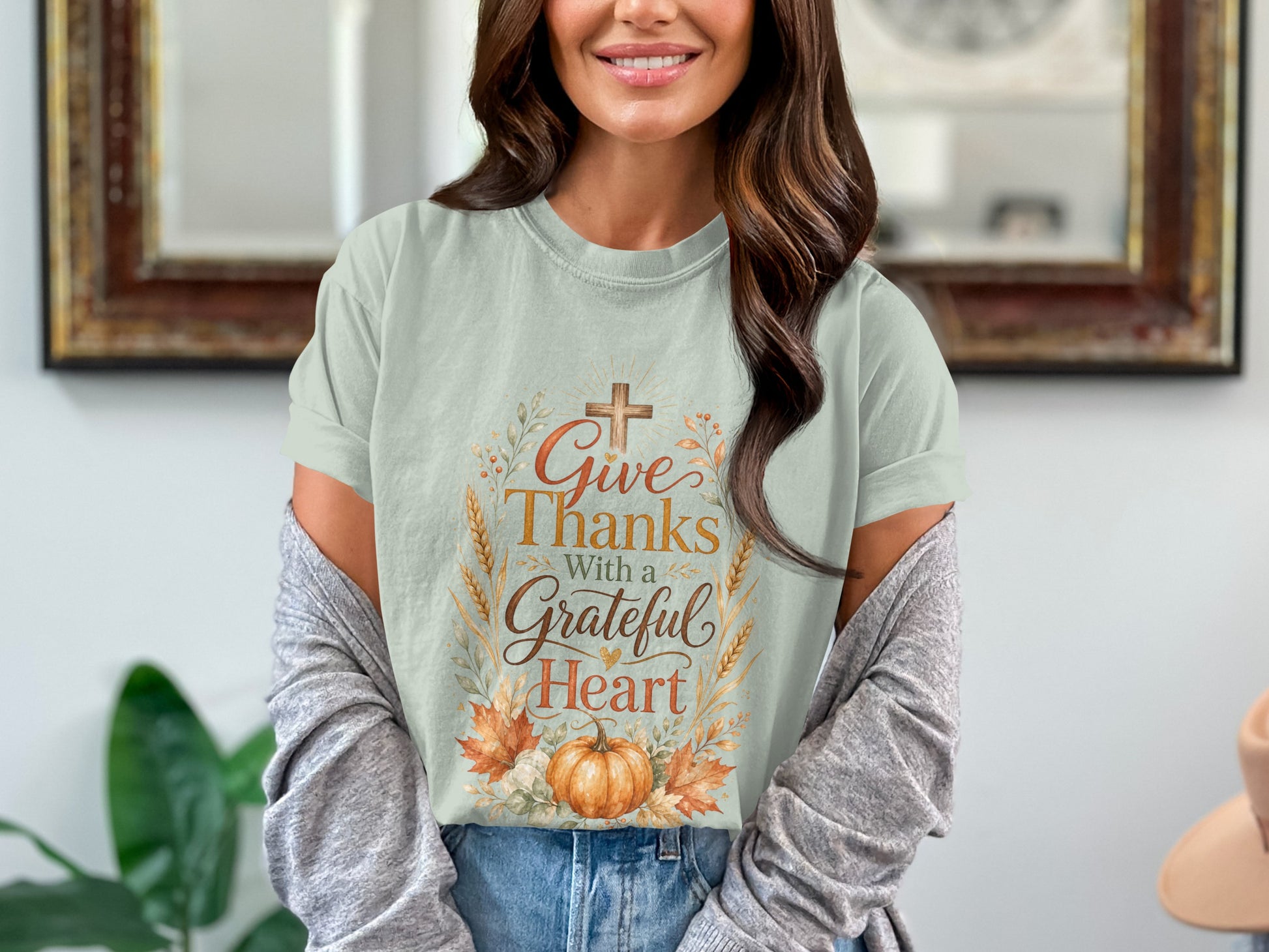 Light green t-shirt with "Give Thanks With a Grateful Heart" design.