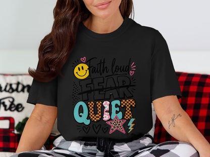 Black t-shirt with "Faith loud fear quiet" graphic, smiley face, and star.