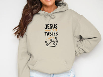 Beige hoodie with "Jesus probably flipped tables" graphic.
