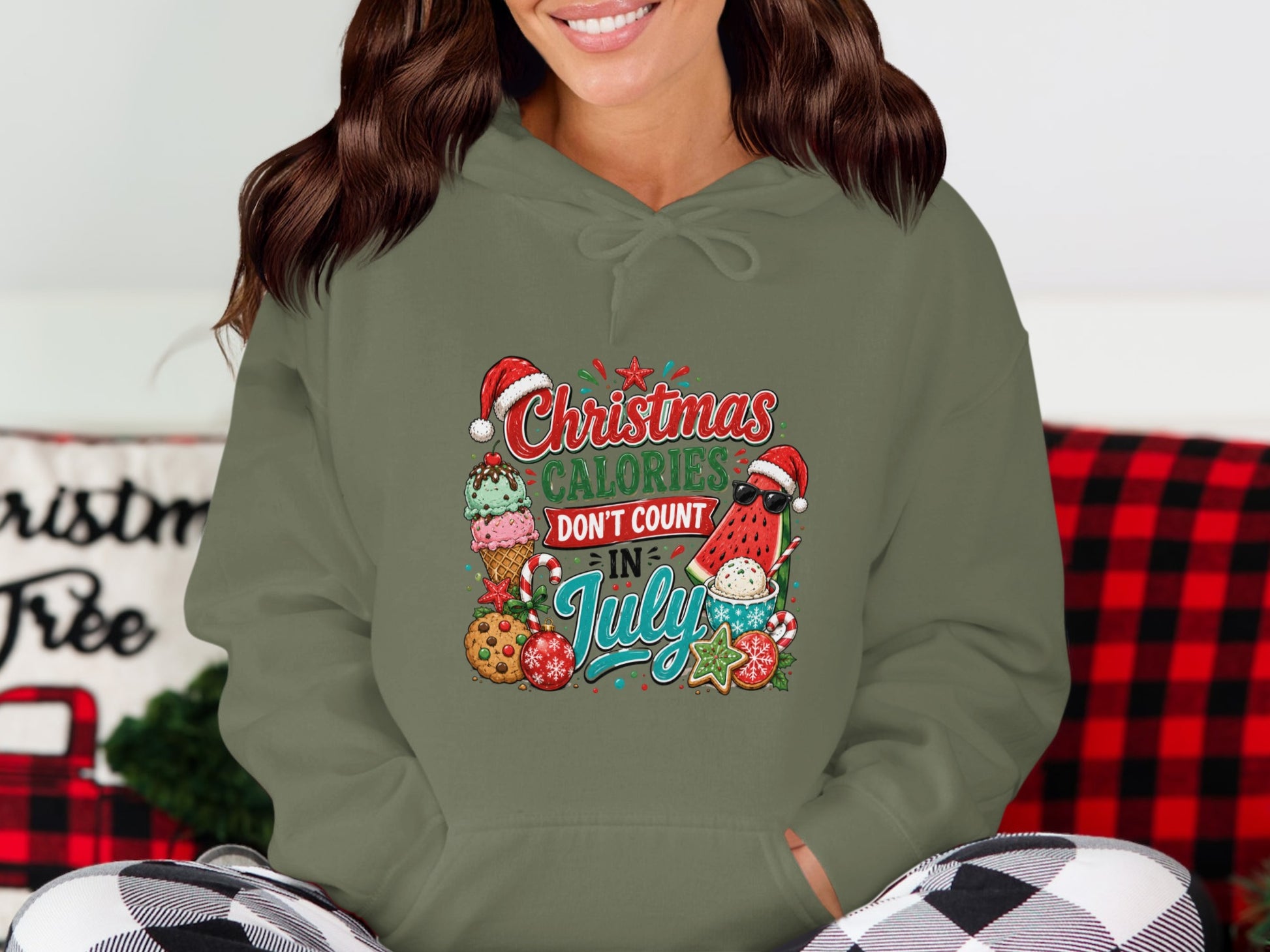 Hoodie with Christmas in July graphic featuring ice cream, cookies, and watermelon.