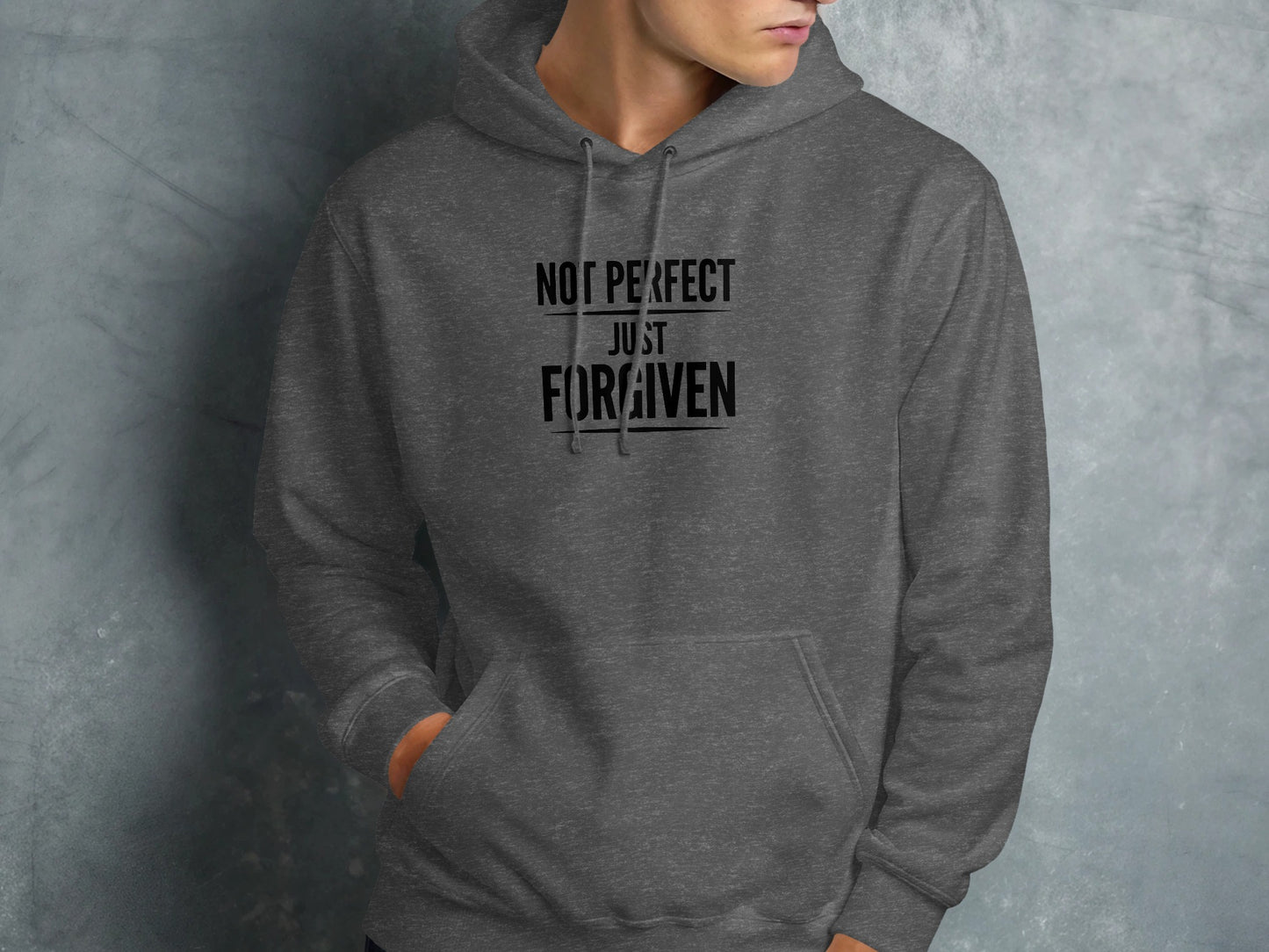 Dark grey hoodie with "NOT PERFECT JUST FORGIVEN" text.