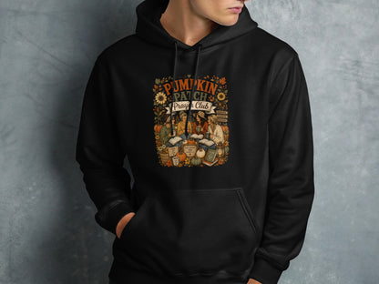 Black hoodie with "Pumpkin Patch Prayer Club" graphic featuring pumpkins, books, and scripture.