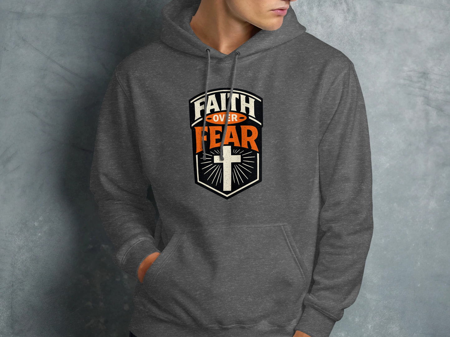 Dark gray hoodie with "Faith Over Fear" and a cross emblem.