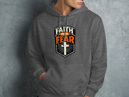 Dark gray hoodie with "Faith Over Fear" and a cross emblem.
