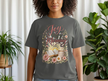 Dark grey t-shirt with "Joy Comes in the Morning" floral design featuring sun, book, and coffee.