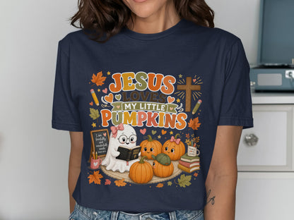 Jesus loves my little pumpkins with ghost, pumpkins, and bible illustration.