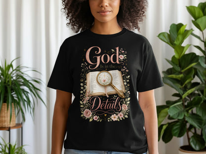 Black t-shirt with "God Is in the Details" floral design and Bible verses.