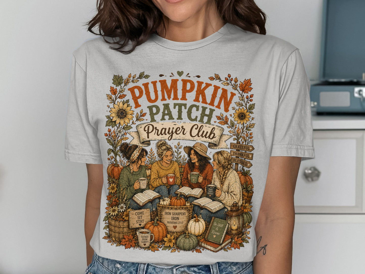 T-shirt with "Pumpkin Patch Prayer Club" and autumnal graphics.