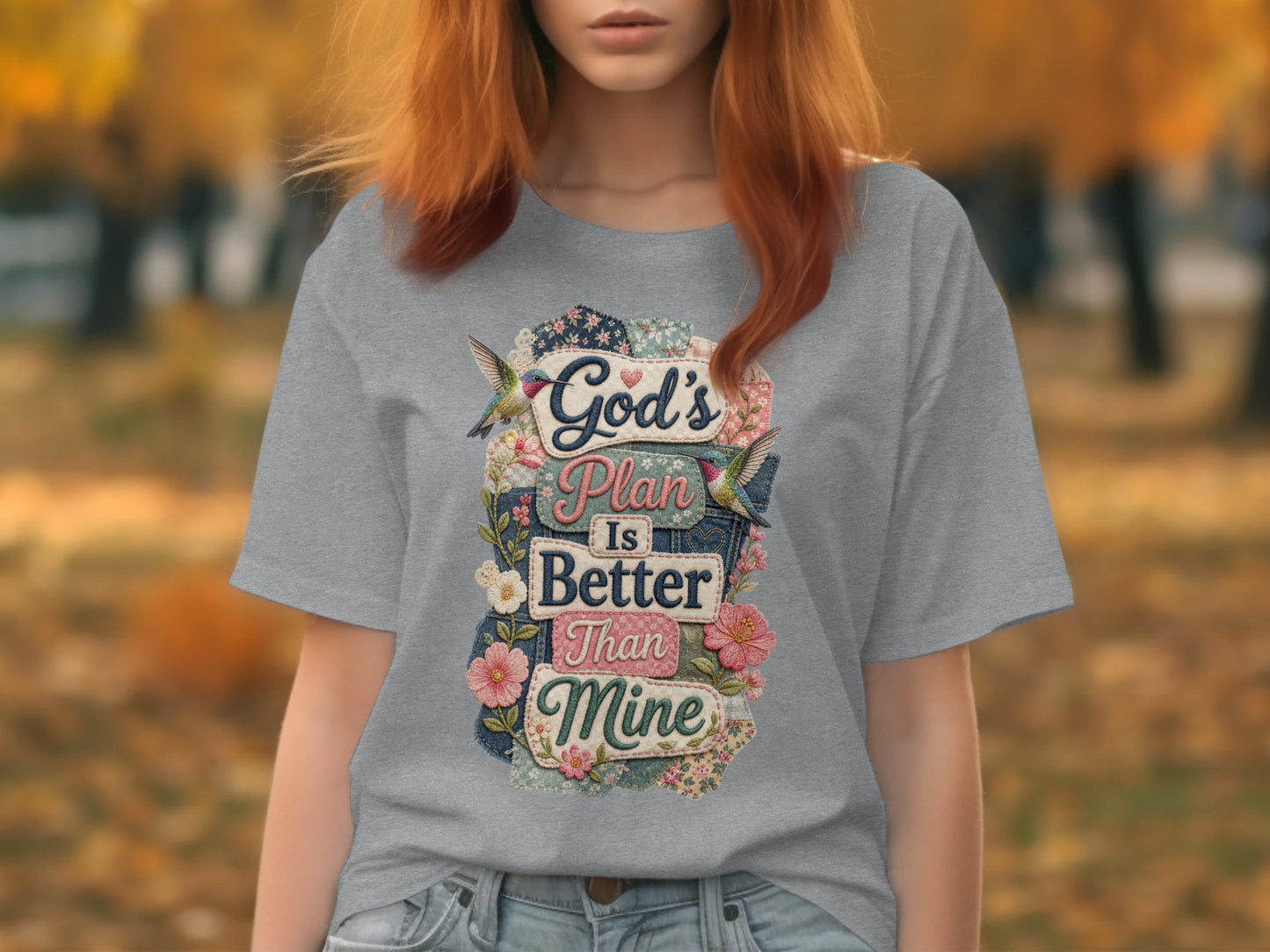 Gray t-shirt with floral design and text "God's Plan Is Better Than Mine".